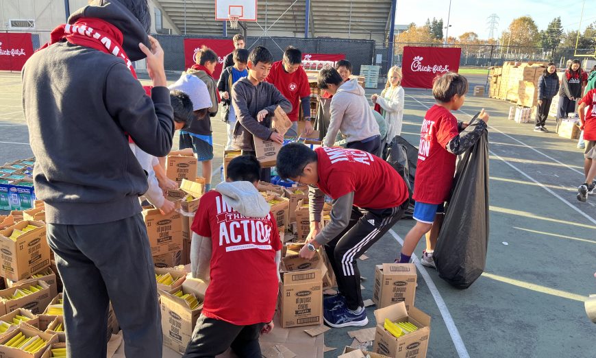 The King’s Academy students with the Chick-fil-A Leader Academy packed care packages to help people over the holidays.