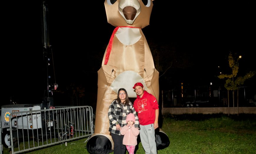 Community member Mike Walke pushed the button and lit the tree at Santa Clara's Central Park, upholding a more than a century old holiday tradition.